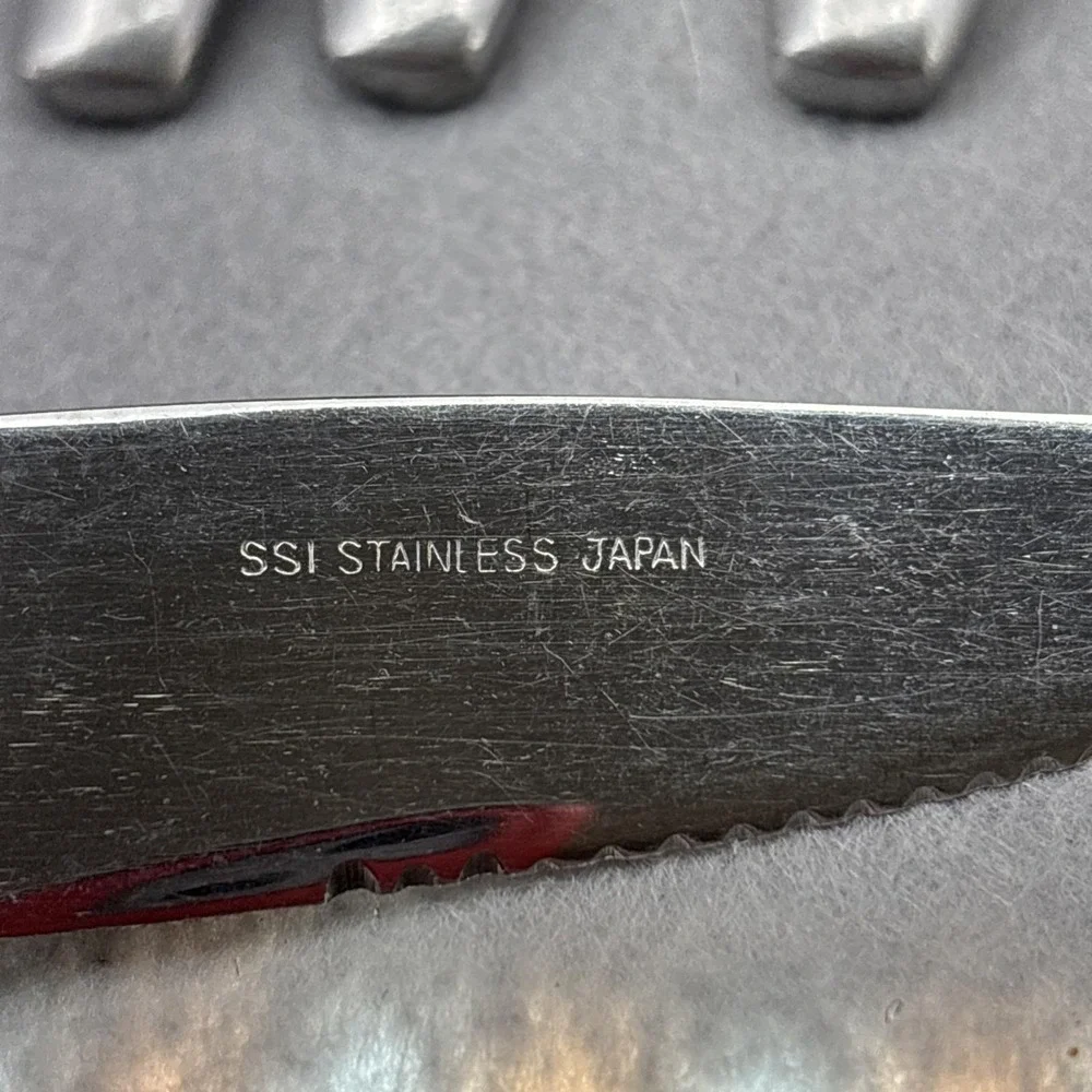 SSI Stainless Japan Black Canoe Style Resin Handle Serrated Edge Dinner Knife 6‎